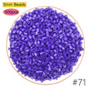 A pile of 5mm purple beads, 500 pieces, used for creative fuse bead craft kits.