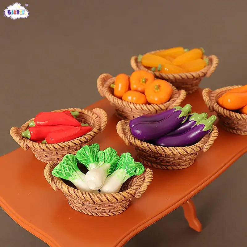 A miniature dollhouse vegetable basket play set filled with various colorful vegetables like carrots, peppers, and leafy gree