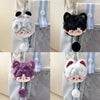 A collection of plush cat pendants featuring white, black, and purple fur, suspended from silver chains.