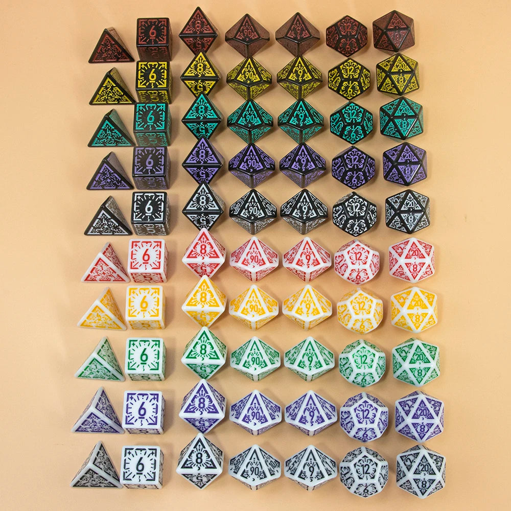 A set of seven fantasy carved polyhedral dice in various colors and shapes arranged in a grid.