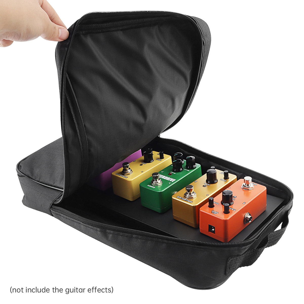A black padded carry bag containing a compact aluminum guitar pedalboard with various effects pedals.