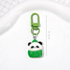A small green panda charm keychain with a silver ring, shown against a white background.