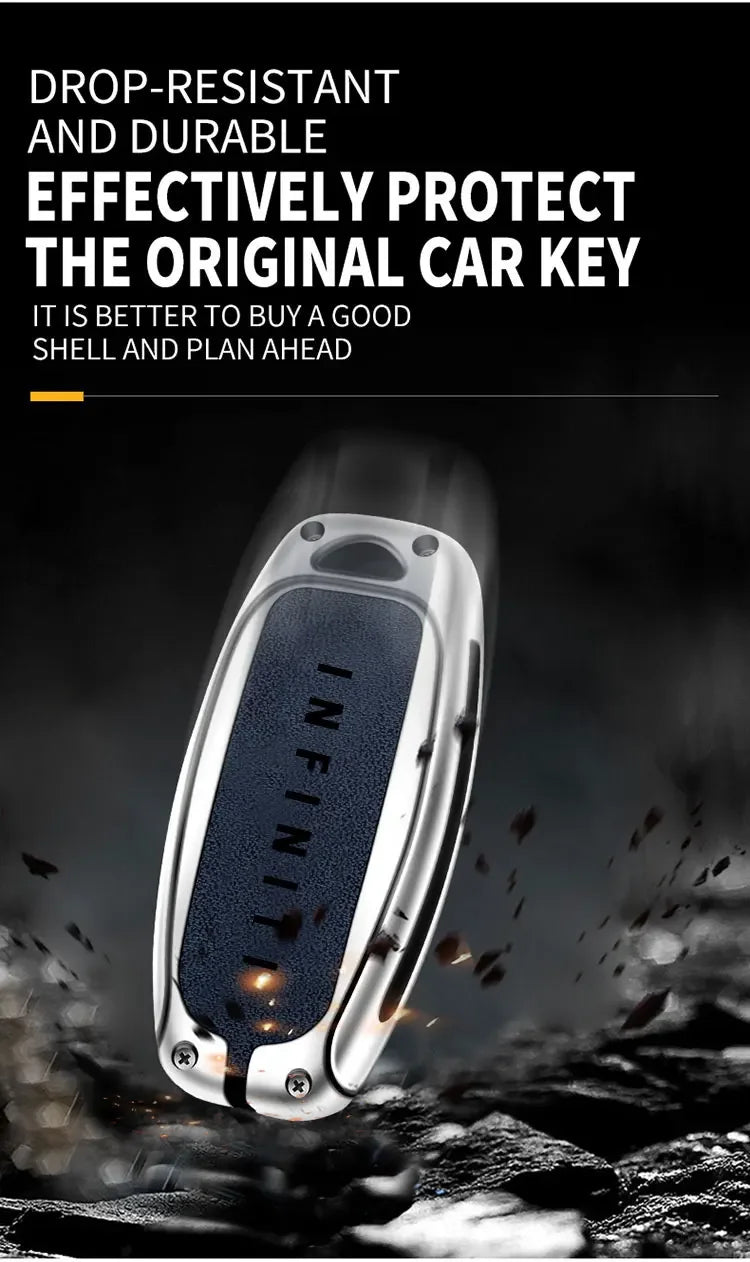 A close-up shot of a silver key case cover protecting an original car key, emphasizing its drop-resistant and durable design.