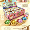 A set of six glitter unicorn bun squishy toys in various colors and textures packaged in a box.