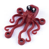 A red plastic marine animal building block set featuring a shark or octopus figure.