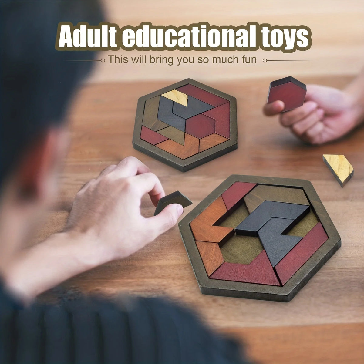 Hands are assembling a wooden hexagon tangram puzzle with various colored pieces on a wooden table.
