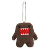 A brown, squishy-looking plush charm with a stitched mouth and white teeth, hanging from a silver chain.