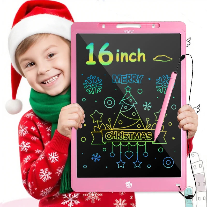 A smiling child wearing a red sweater and green scarf holds a pink 16-inch LCD writing tablet decorated with Christmas themes