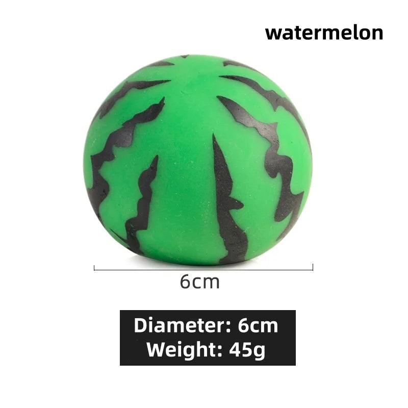 A bright green watermelon-themed squishy toy with black leaf patterns, shown from above.