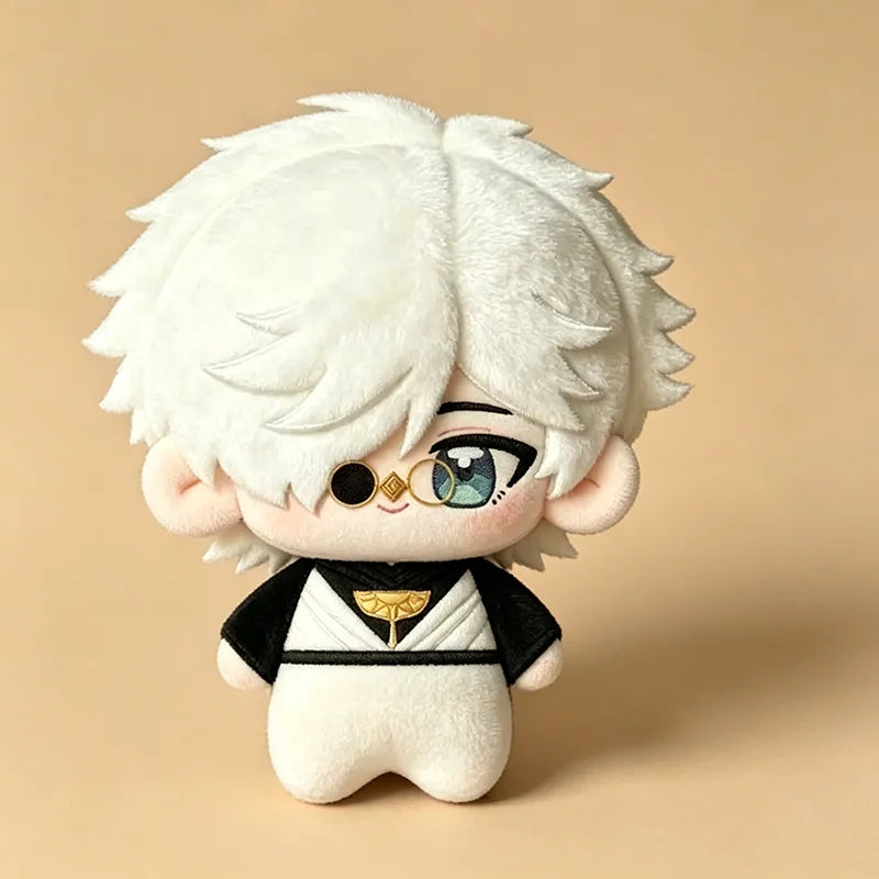 A white plush doll with light hair and gold accents, resembling a witch hat theme.