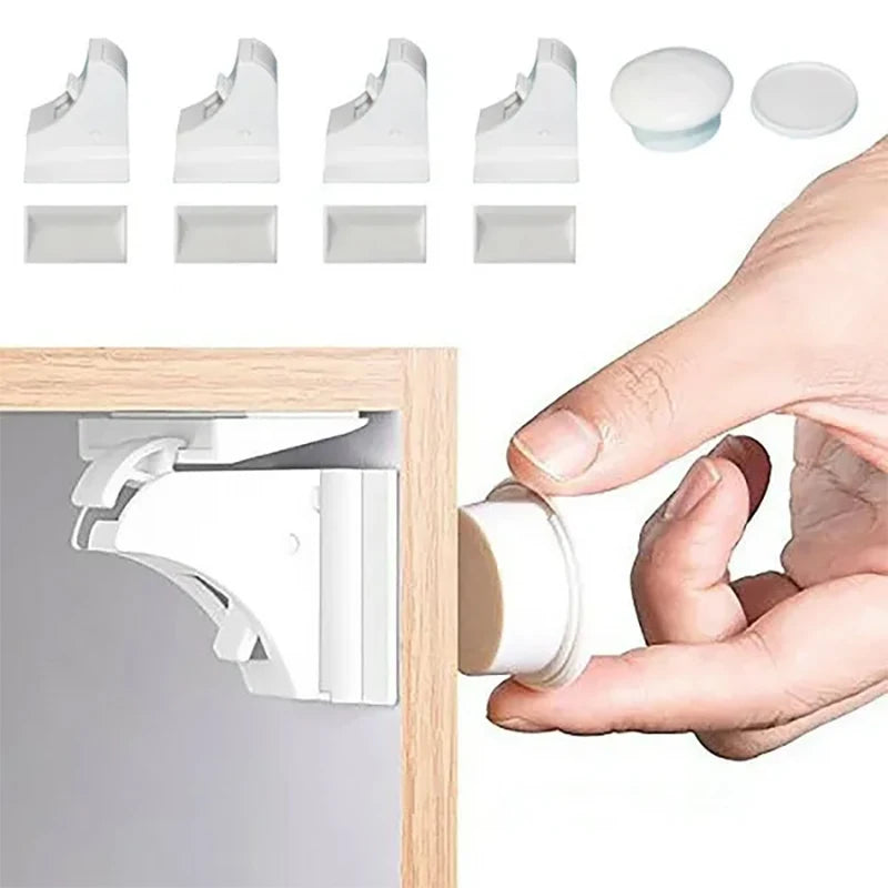 A hand is installing a magnetic child safety lock onto a cabinet door using a wooden frame.