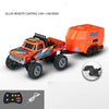 An alloy remote control car with a truck body and travel trailer, shown next to its controller.