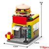 A yellow and red mini city shop building block set featuring a storefront and various colorful components.