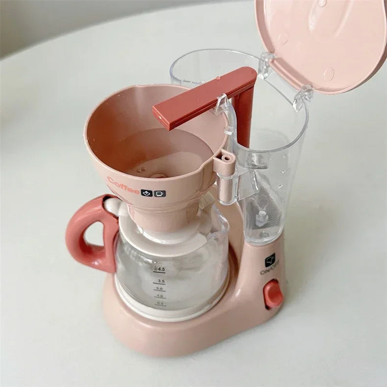 A pink kids pretend play kitchen set featuring a coffee maker, water dispenser, and toaster.
