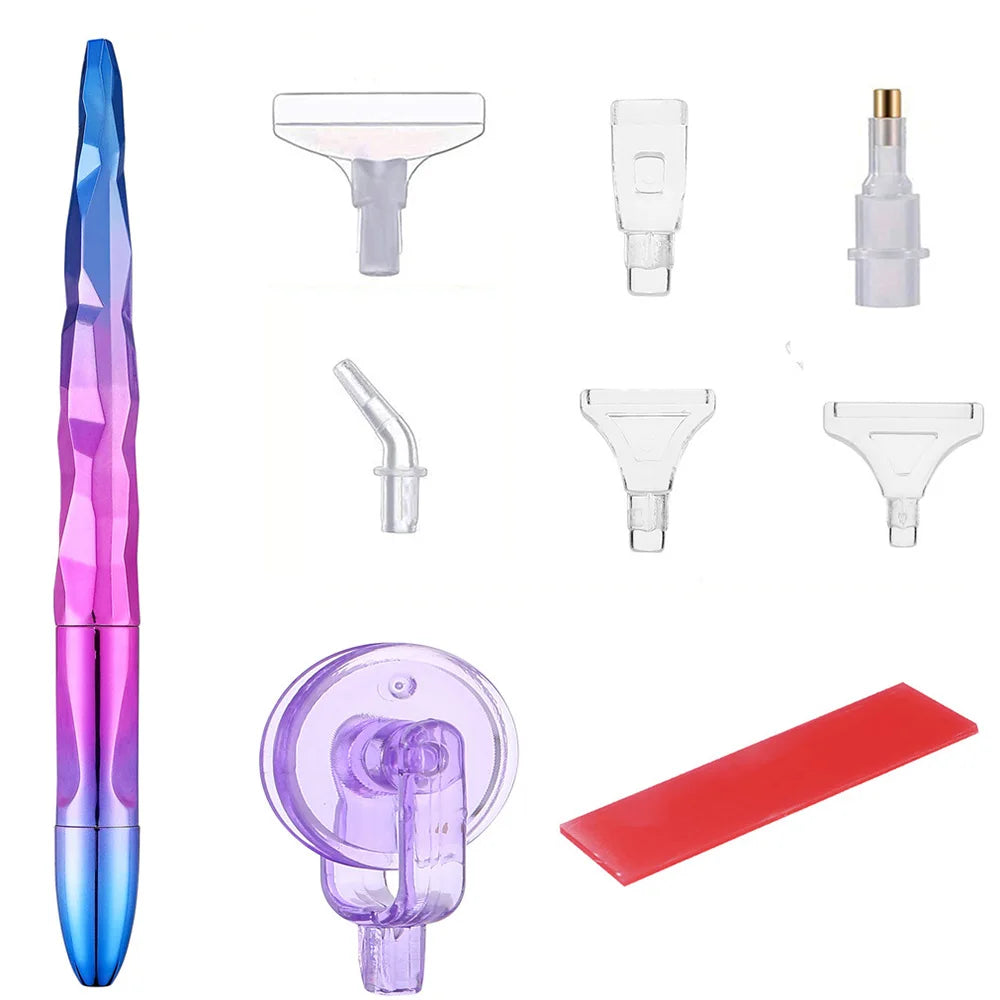 A collection of diamond painting tools including a pen, roller tool, and various tips and rollers.