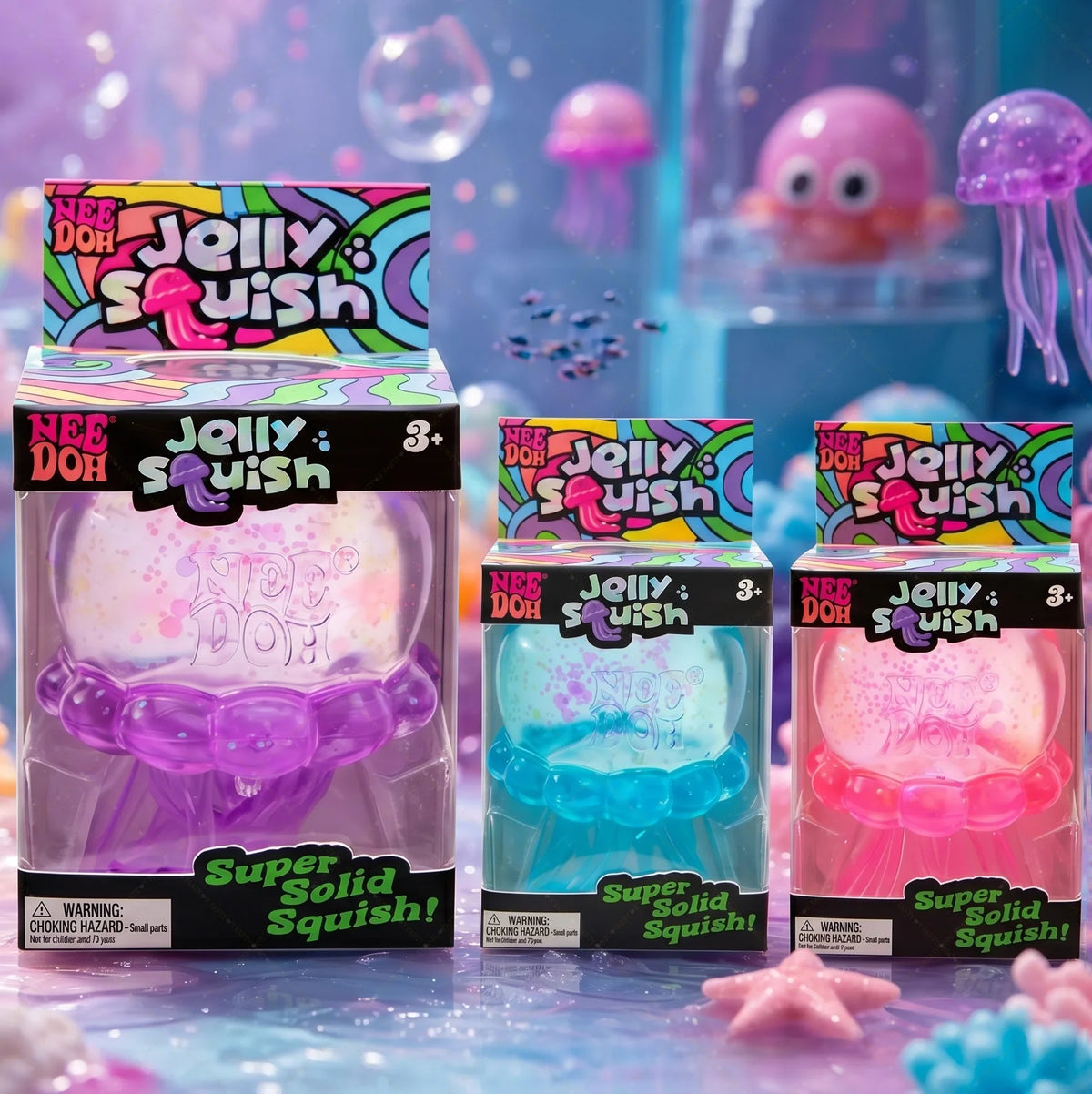 A box of Nee Doh Jelly Squish toys in various colors, including purple, blue, and pink, displayed on a surface.