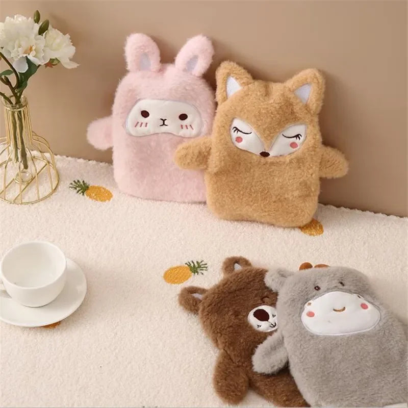 A collection of cute plush toys including a pink bunny, a brown fox, and a gray bear sitting on a white surface.