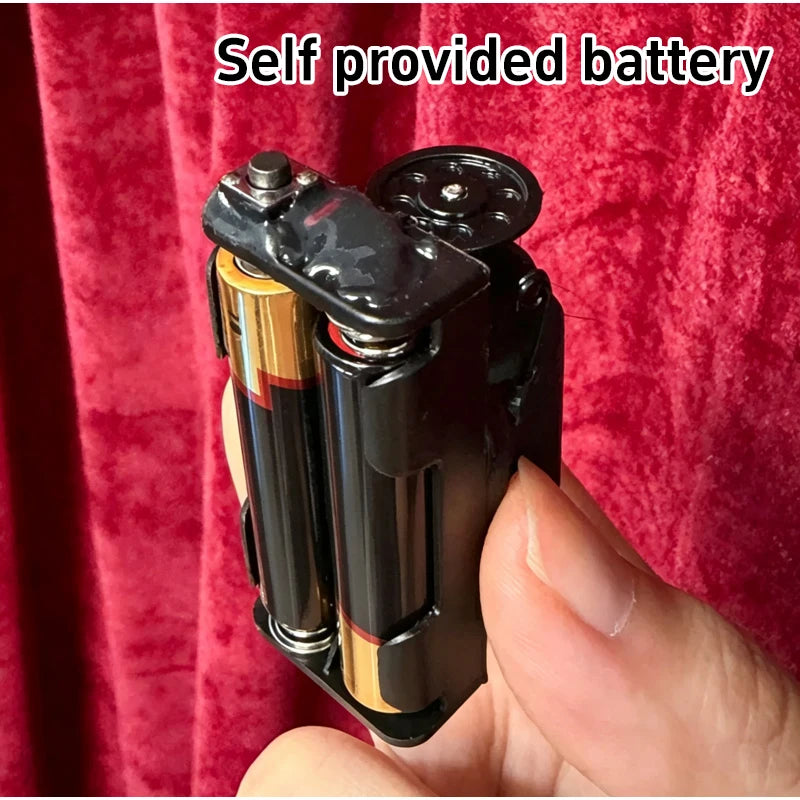 A hand holds a professional floating can magic trick with levitation effect, featuring a self-provided battery.