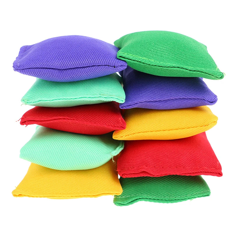 A stack of ten colorful mini bean bags in shades of purple, green, red, and yellow.