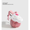 A pink mini backpack with a mushroom design and yellow accents, featuring a striped fabric section.
