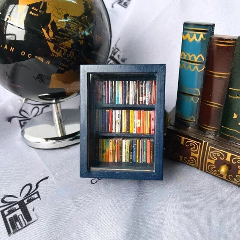 A handcrafted wooden miniature bookshelf ornament featuring small books and a decorative leather-bound book.