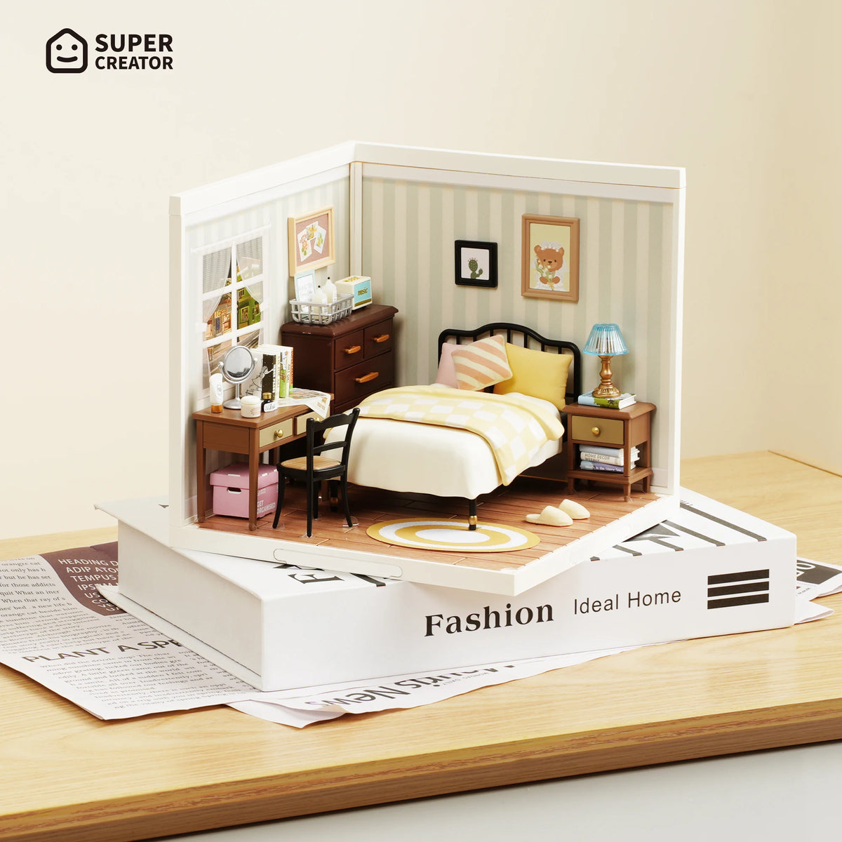 A miniature dollhouse kit depicting a sweet dream bedroom with furniture and LED lighting.