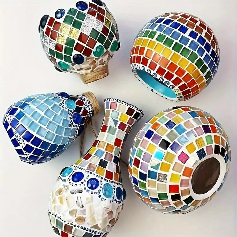 A collection of colorful mosaic glass tiles shaped into spherical and vase-like decorative objects.