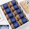 A box containing 10 balls of YEDAN MERIN worsted wool thread yarn for knitting projects.