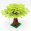 A model of a cherry blossom tree built from green interlocking plastic blocks with a brown trunk and green base.