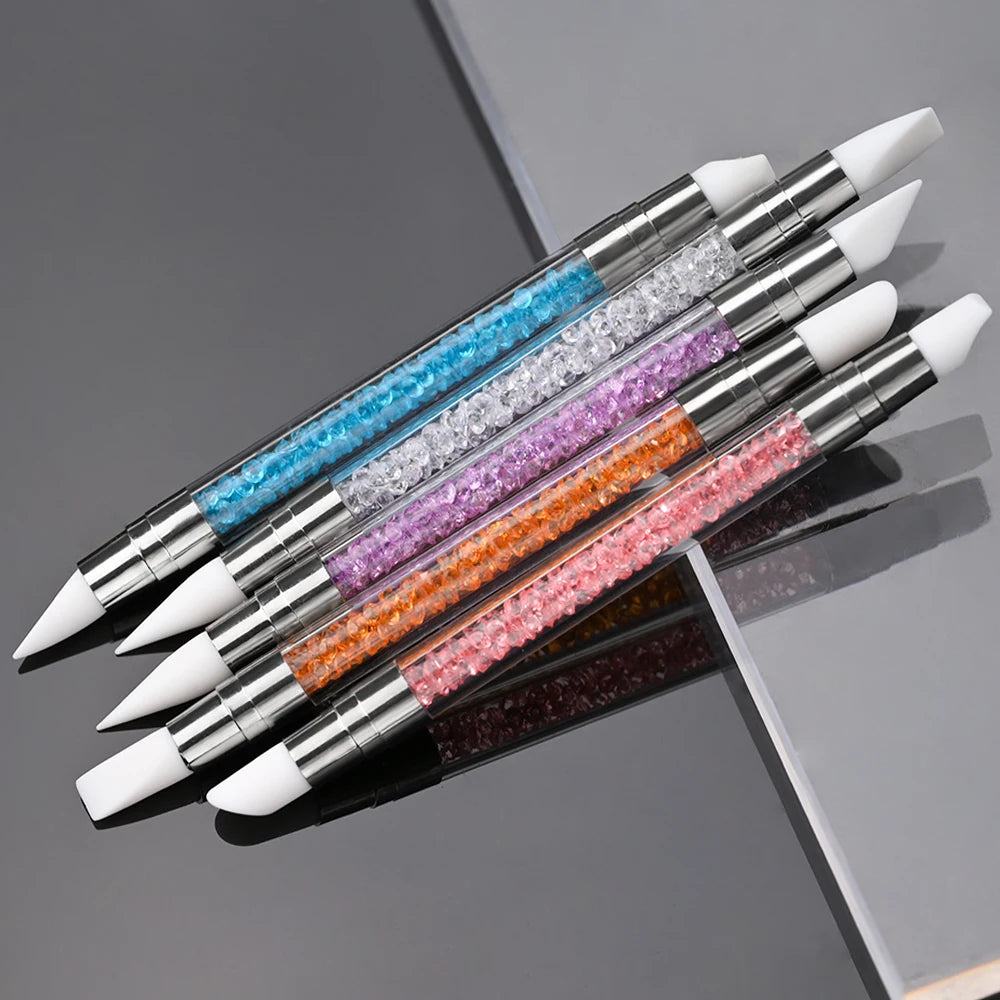 A set of five double-ended silicone dotting pens featuring various glitter colors for nail art and sculpting.