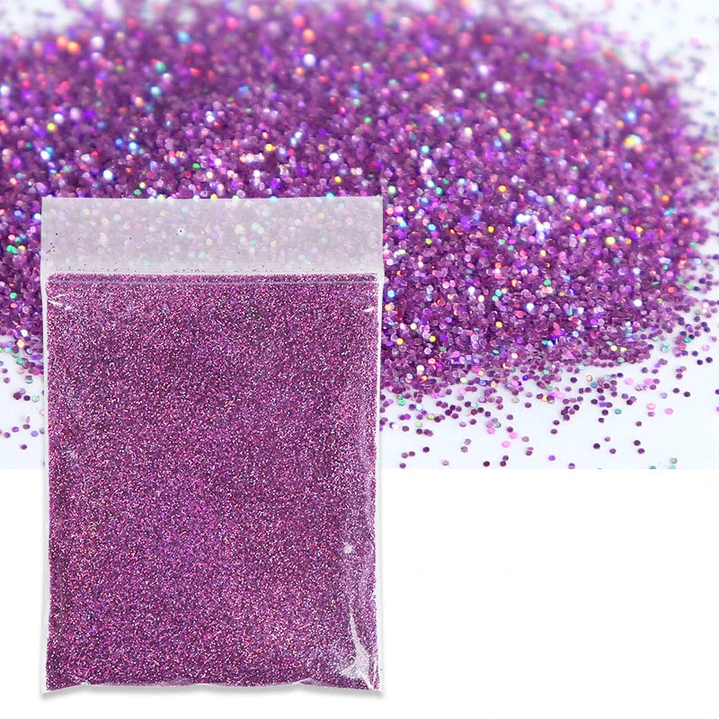 A small plastic bag filled with vibrant purple holographic glitter powder scattered on a white background.