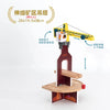 A wooden train track accessory set featuring an airport and gas station scene with a yellow crane mechanism.