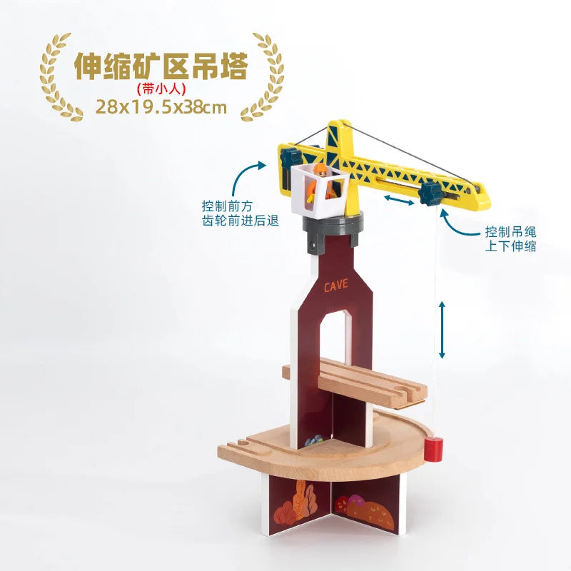 A wooden train track accessory set featuring an airport and gas station scene with a yellow crane mechanism.