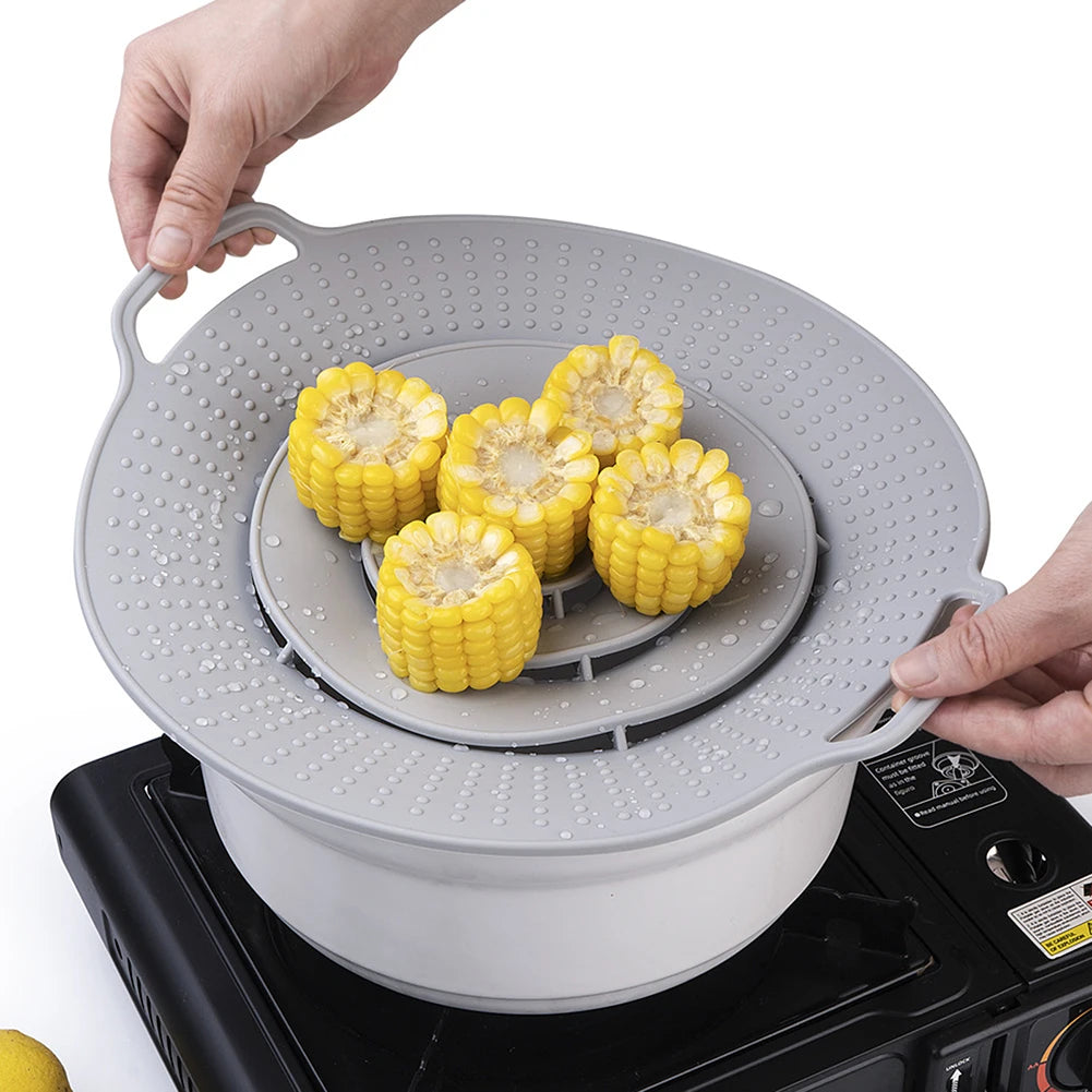 A hand places silicone spill stopper lids onto a cooking pot or pan.