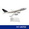 Diecast model of a United Airlines Boeing aircraft in white and blue livery.