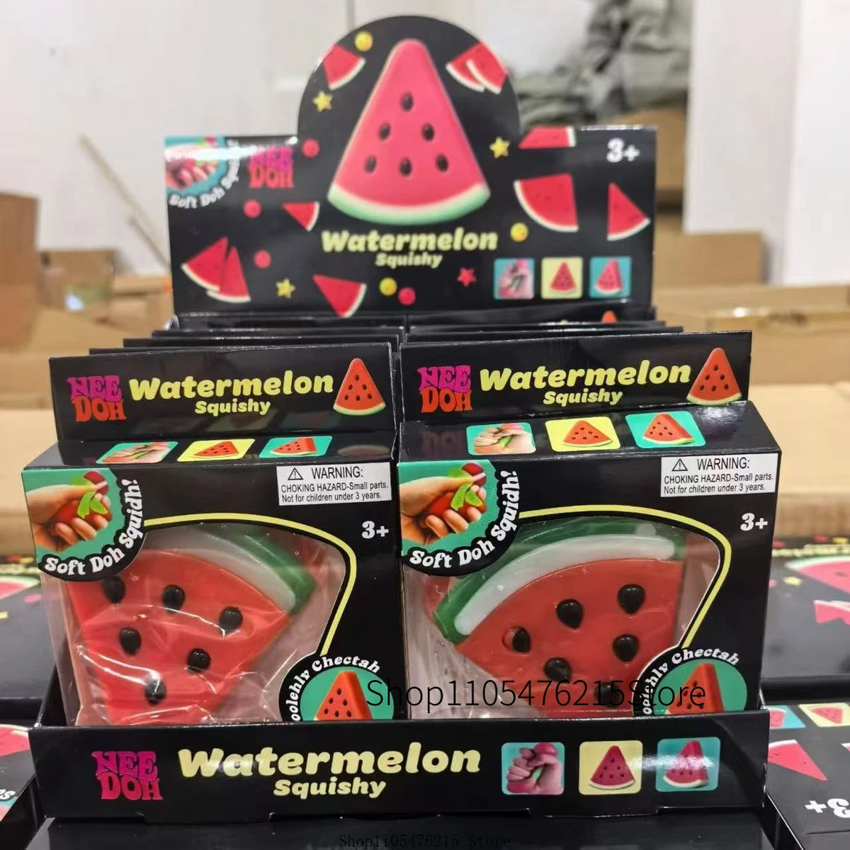 Boxed watermelon squishy fidget toys with various watermelon-themed shapes and colors
