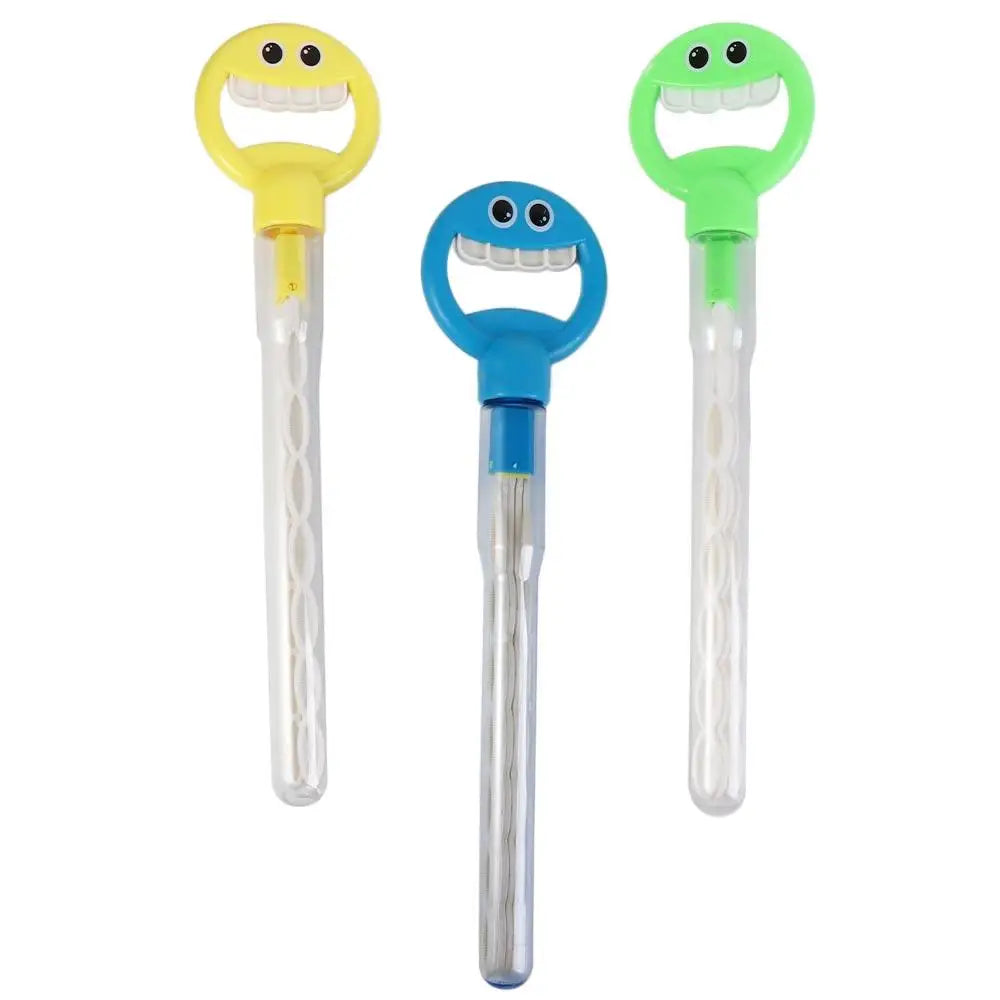 A pair of plastic bubble wands with smiling faces in yellow and green.