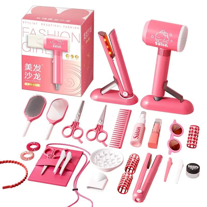 A pink beauty salon playset featuring various styling tools like a hair dryer and straighteners for pretend play.