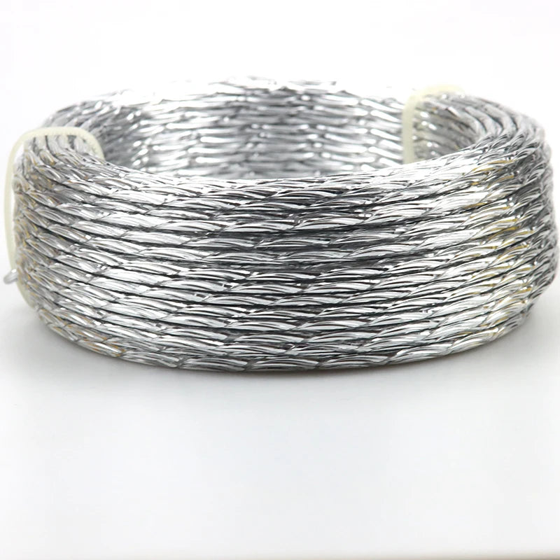 A coil of flexible silver aluminum craft wire used for jewelry making and DIY projects.