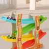 A set of four wooden racing gliders and tracks for children to use in a visual tracking activity.