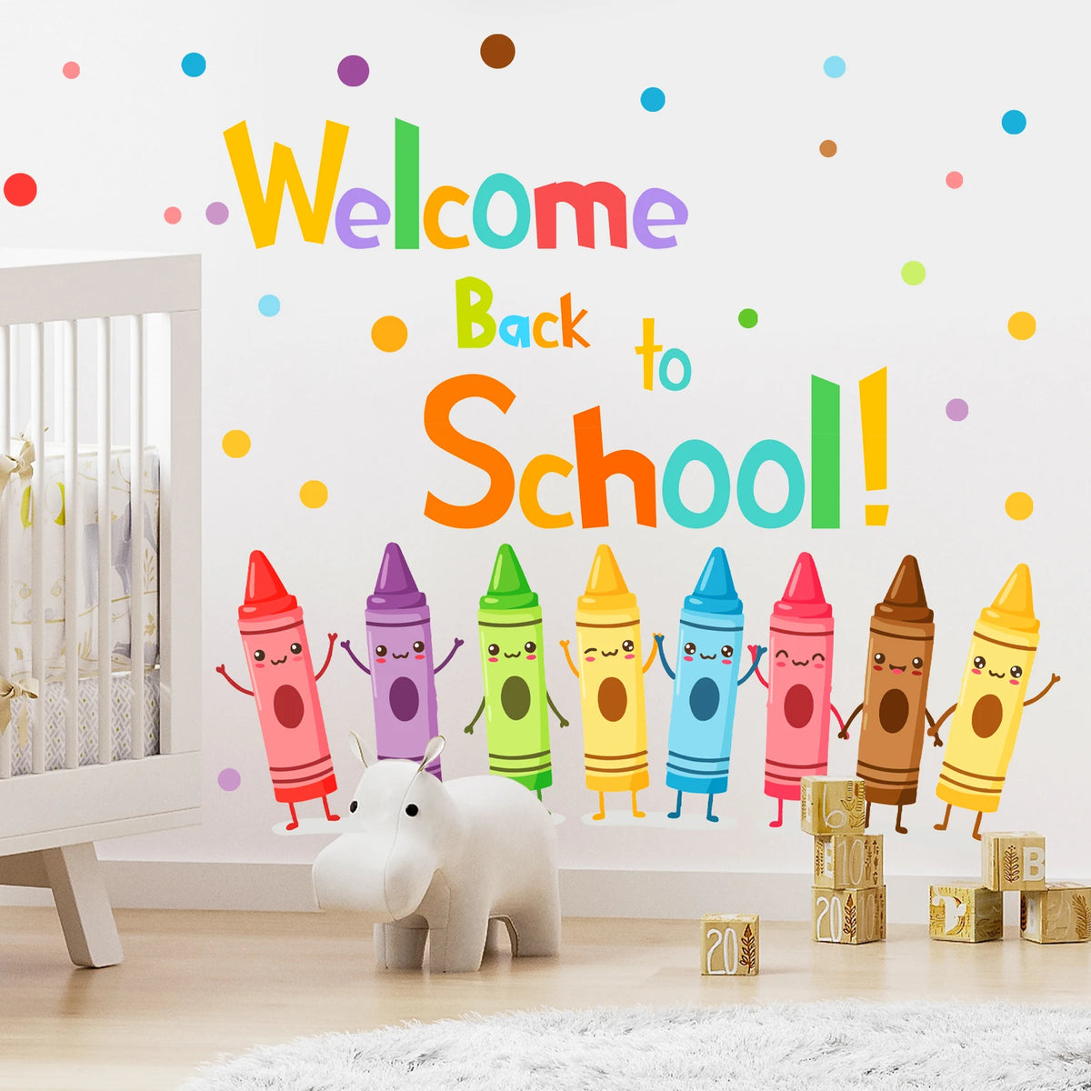A colorful wall sticker set featuring letters and exclamation marks welcoming students back to school, with an elephant toy i