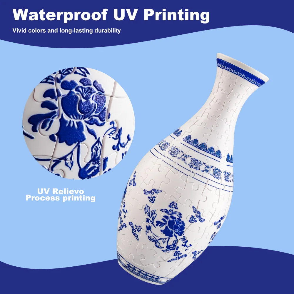 A white porcelain flower vase decorated with blue floral patterns and a blue and white puzzle piece design.