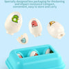 A teal plastic box containing several egg-shaped learning puzzles for toddlers.