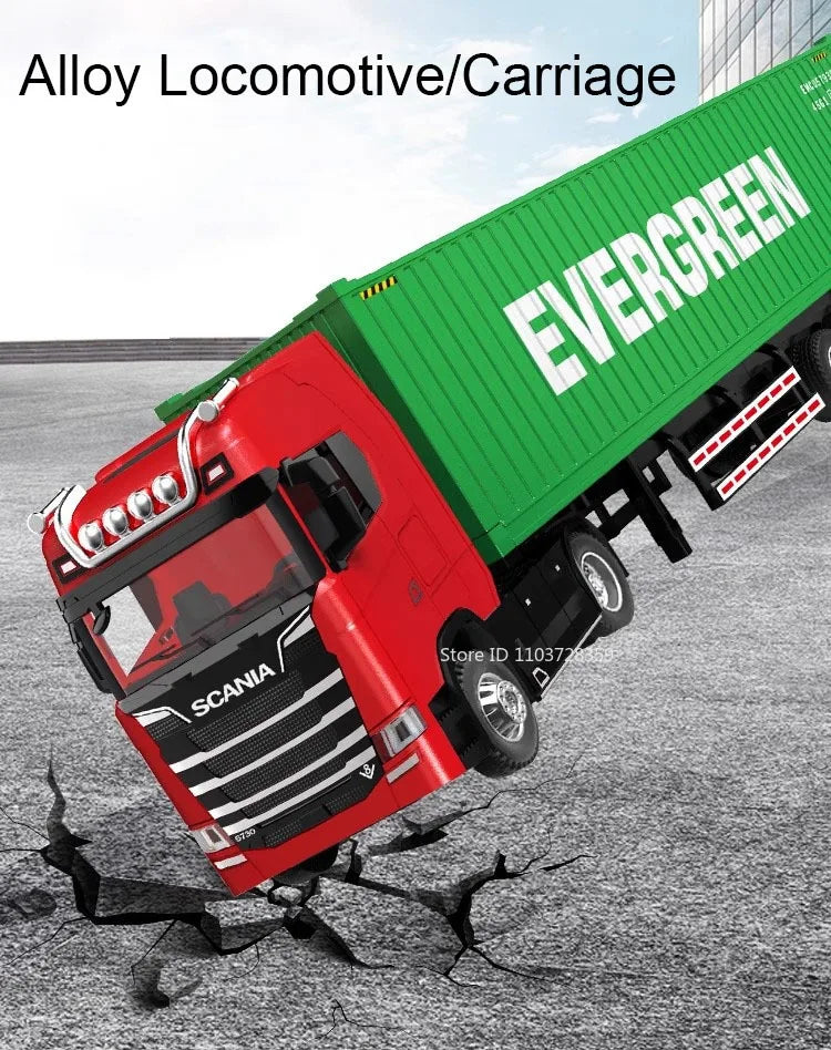 A red Scania locomotive/carriage model with green siding and the word EVERGREEN on it, shown in a close-up view.