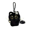 A cute plush black cat keychain with gold eyes and a silver star charm.