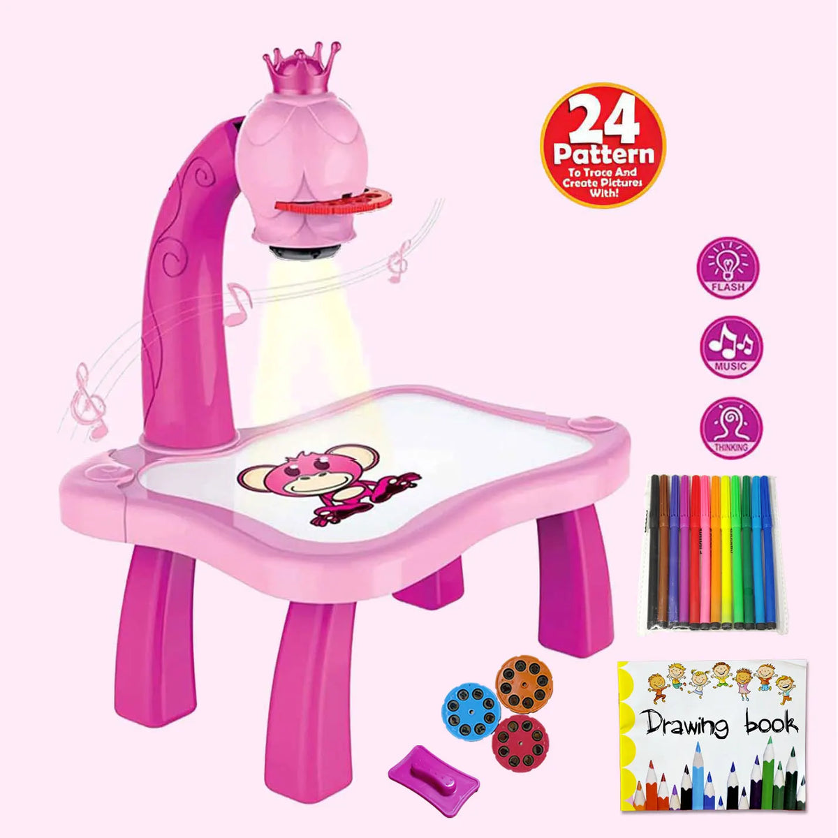 A pink kids drawing projector with a mouse head and a tray of colored pencils and a drawing book.