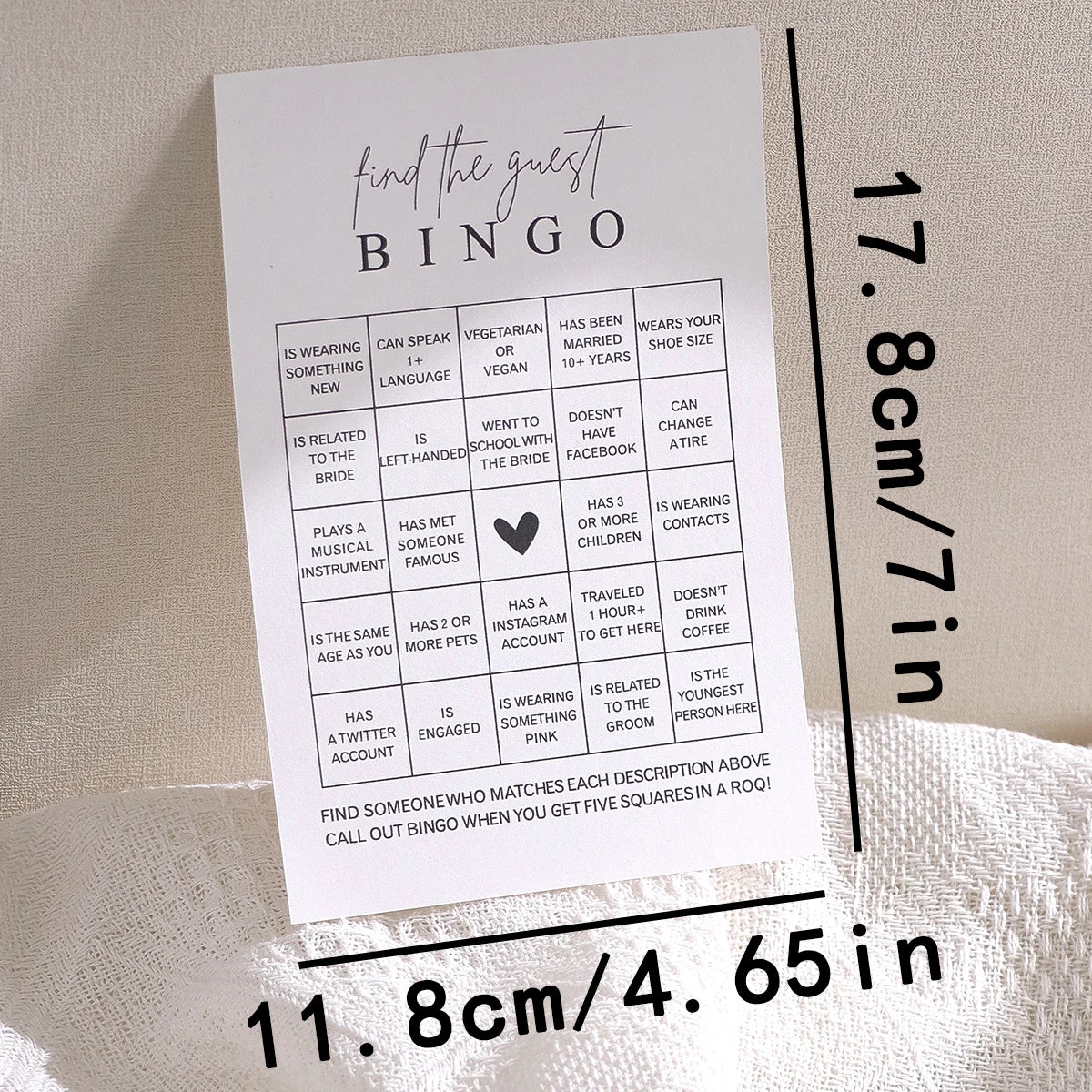 A card for a Bridal Shower Bingo game titled Find the Guest Bingo with various prompts like Is wearing something new or is re