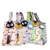 A collection of various animal-themed fabric toys and plush animals.