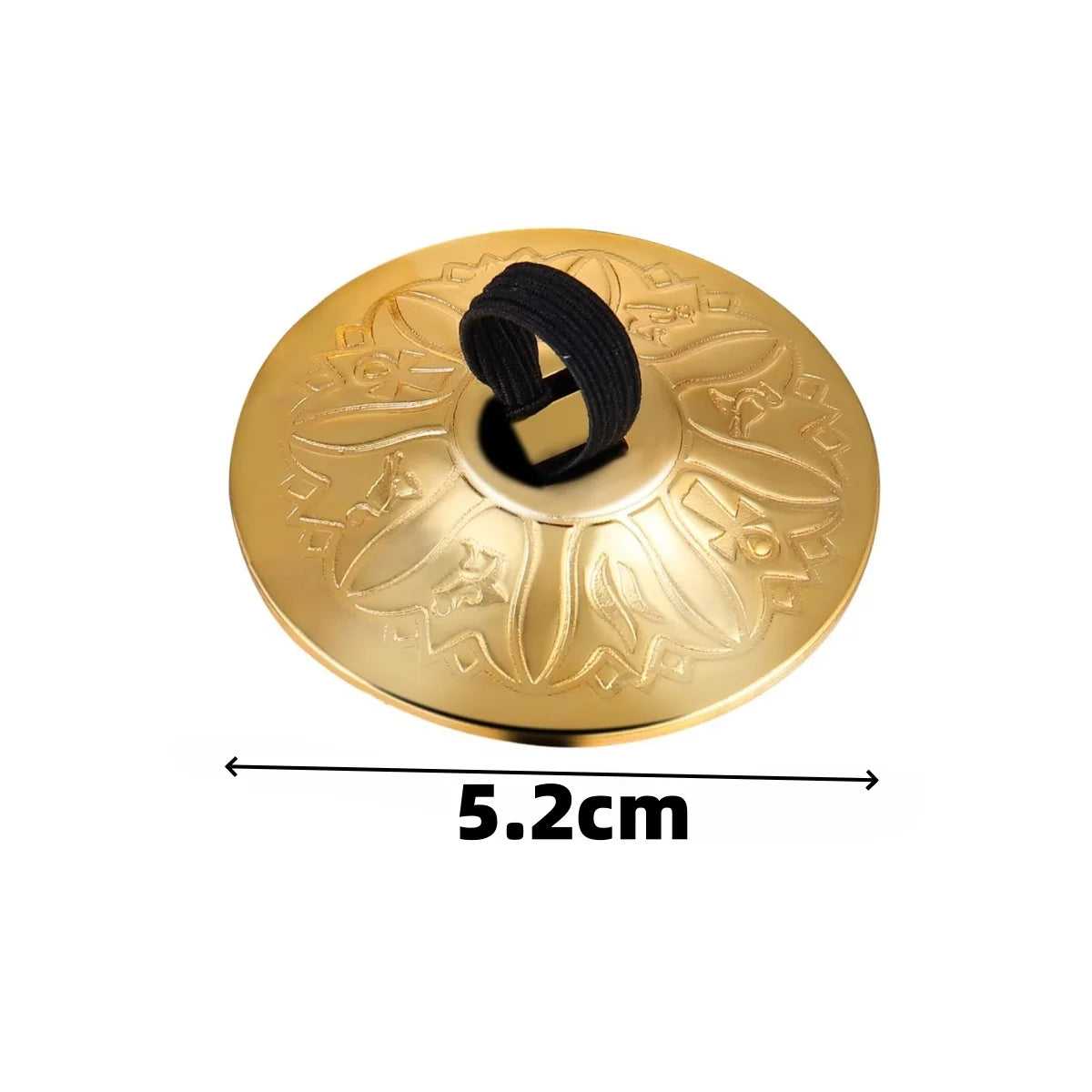 A round brass or gold-colored percussion instrument with a black loop, likely a mini copper finger cymbal.