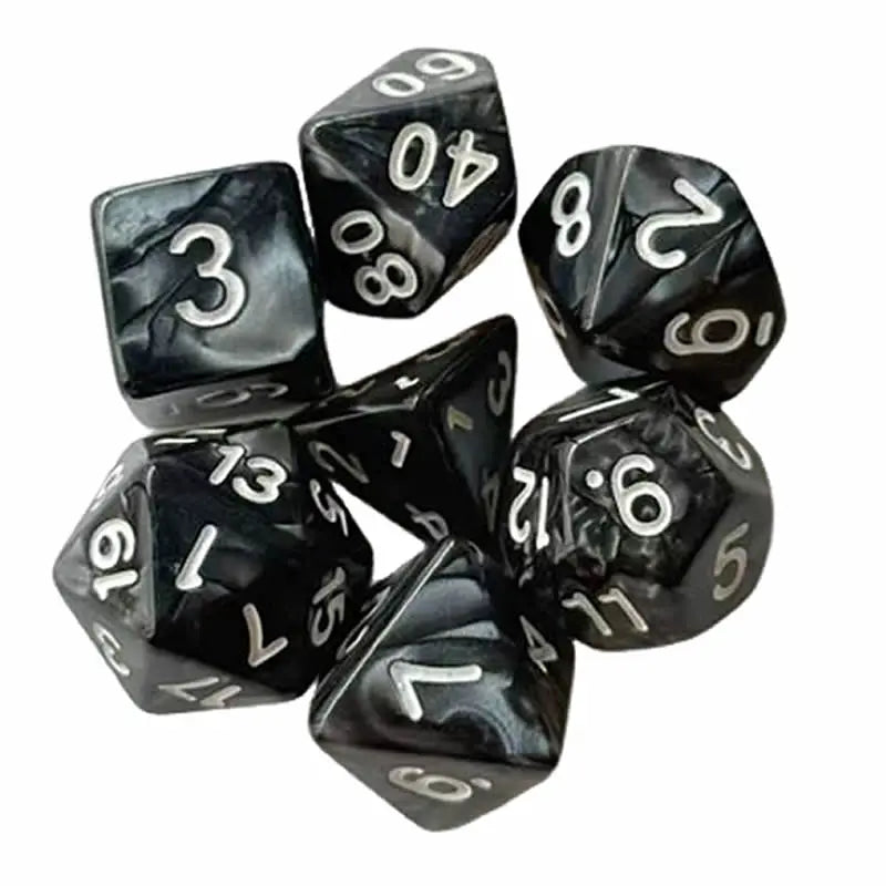 A set of seven black polyhedral dice showing various numbers and shapes used for tabletop games.